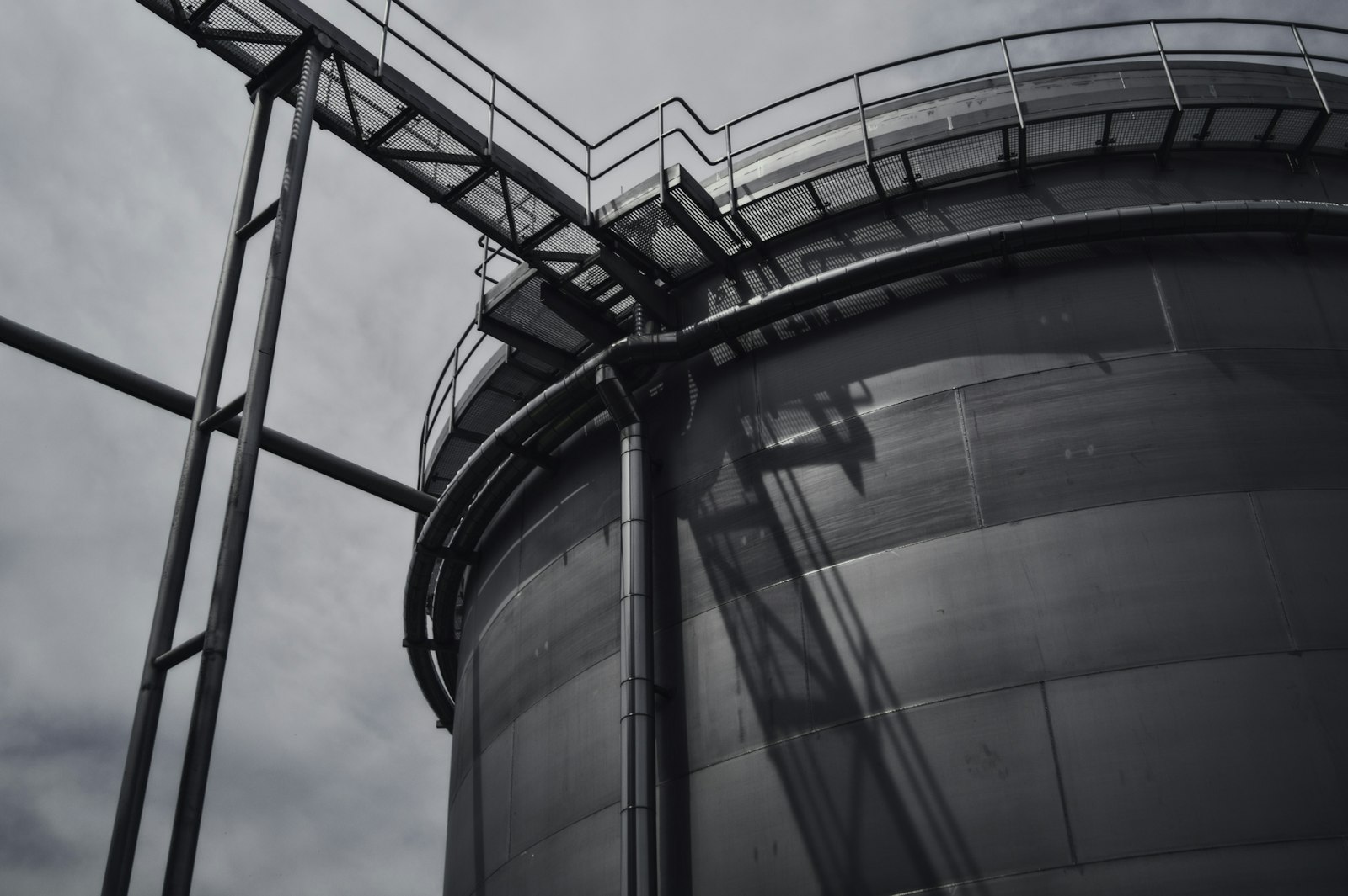 Large steel storage tank with an external access stairway